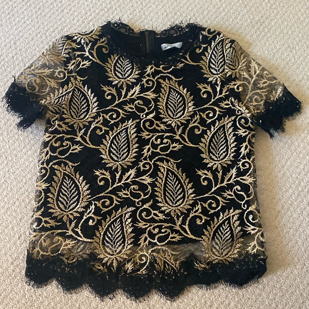 Anthropologie Black and Gold top